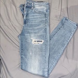 American Eagle ripped covered jeans